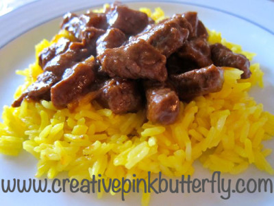 Beef stew with coconut milk and turmeric rice
